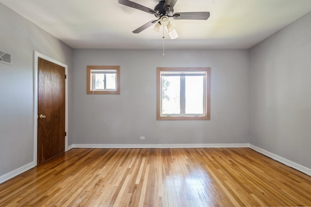 1718 Hovland Ct, Evanston, IL 60201 - empty room with light wood finished floors and ceiling fan
