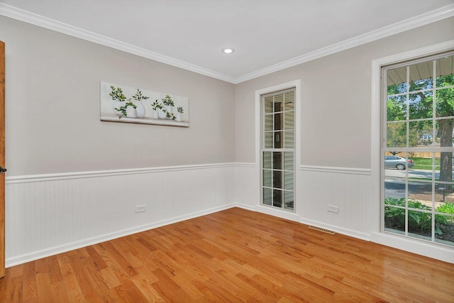 336 Brooklea Ct, Naperville, IL 60565 - spare room featuring wood finished floors, a wainscoted wall, crown molding, and recessed lighting