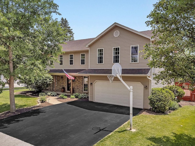 336 Brooklea Ct, Naperville, IL 60565 - view of front facade featuring an attached garage, asphalt driveway, a front yard, and roof with shingles