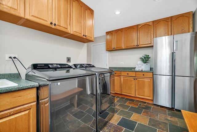 336 Brooklea Ct, Naperville, IL 60565 - laundry room with separate washer and dryer, recessed lighting, and dark stone finish flooring