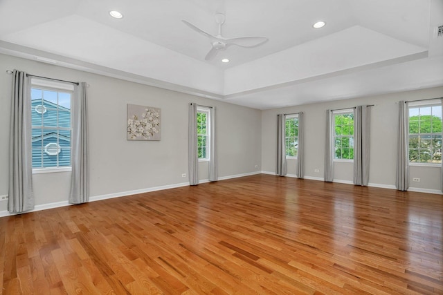 336 Brooklea Ct, Naperville, IL 60565 - spare room featuring a tray ceiling, light wood finished floors, recessed lighting, and a ceiling fan