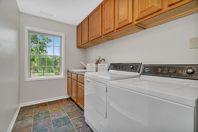 336 Brooklea Ct, Naperville, IL 60565 - laundry area featuring cabinet space, independent washer and dryer, and dark stone finish flooring