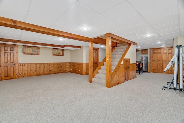 336 Brooklea Ct, Naperville, IL 60565 - finished basement with wainscoting, freestanding refrigerator, light colored carpet, stairs, and a paneled ceiling