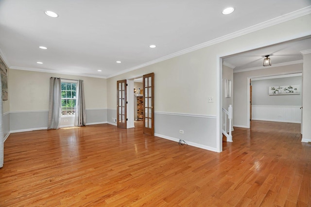 336 Brooklea Ct, Naperville, IL 60565 - unfurnished room featuring light wood-style floors, recessed lighting, crown molding, and french doors