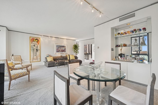 1530 N Dearborn Pkwy Unit 9S, Chicago, IL 60610 - carpeted dining area with rail lighting