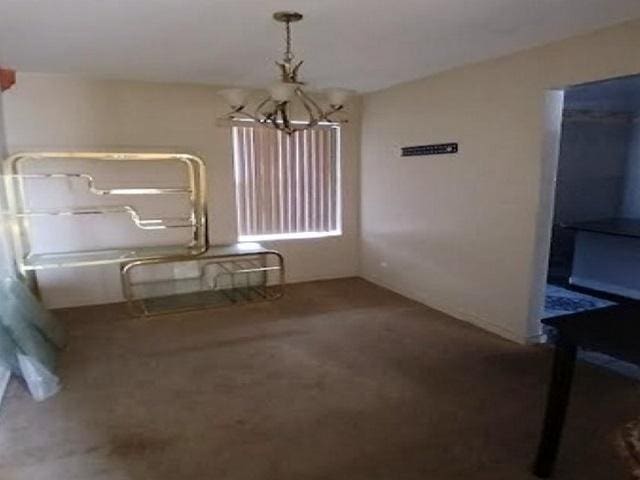 3254 W Flournoy St Unit 1, Chicago, IL 60624 - unfurnished dining area with a chandelier