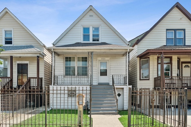 3433 W School St, Chicago, IL 60618 - view of front of house with a porch, stairs, and roof with shingles