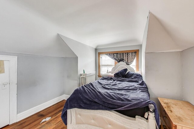 5042 W Wolfram St, Chicago, IL 60641 - bedroom featuring wood finished floors and baseboards