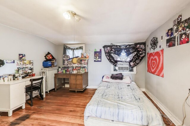5042 W Wolfram St, Chicago, IL 60641 - bedroom with wood finished floors and a desk