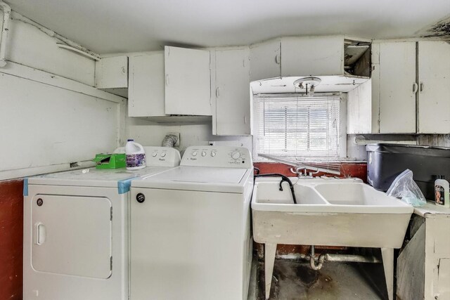 5042 W Wolfram St, Chicago, IL 60641 - washroom featuring washer and clothes dryer and cabinet space
