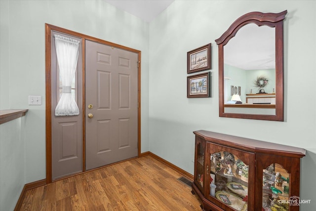 111 Fawn Ln, Elgin, IL 60120 - foyer entrance featuring wood finished floors and baseboards