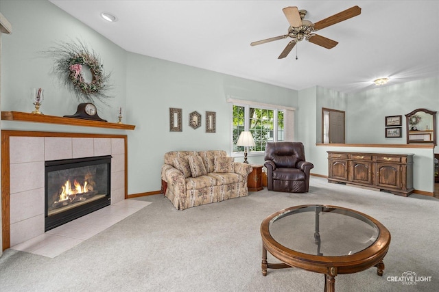 111 Fawn Ln, Elgin, IL 60120 - carpeted living area with a tile fireplace and a ceiling fan