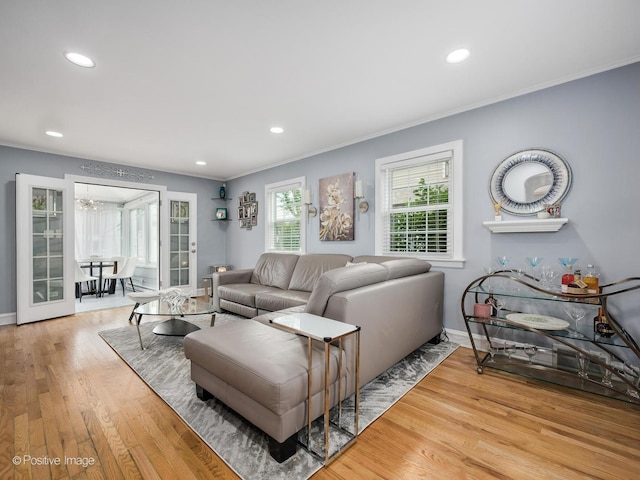 7215 W Foster Ave, Harwood Heights, IL 60706 - living area featuring crown molding, recessed lighting, and light wood-style floors