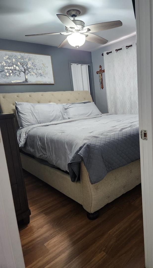 10806 S S Ave O, Chicago, IL 60617 - bedroom featuring wood finished floors and ceiling fan