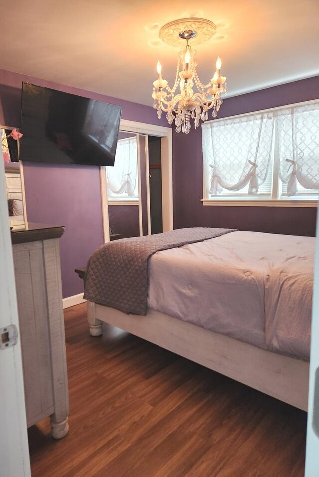 10806 S S Ave O, Chicago, IL 60617 - bedroom featuring wood finished floors and a chandelier