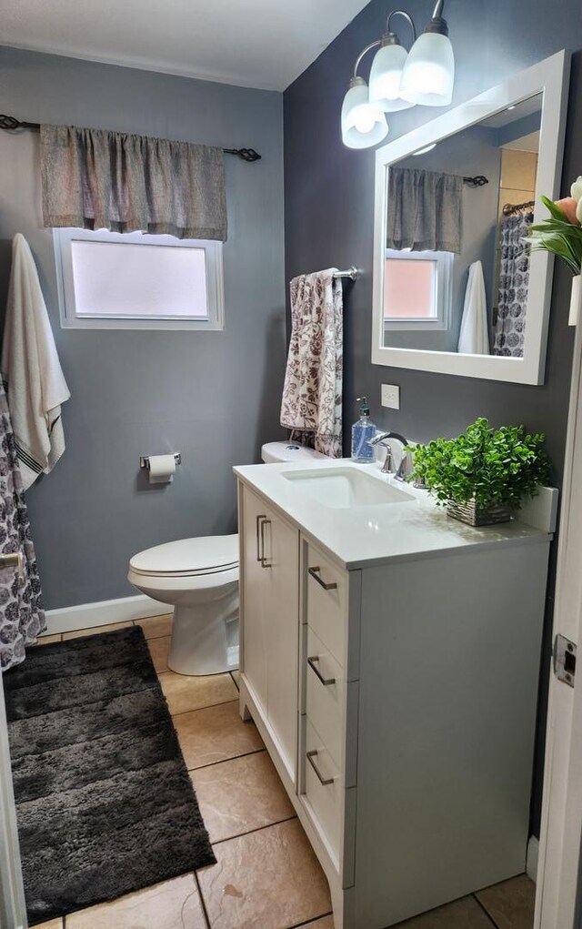 10806 S S Ave O, Chicago, IL 60617 - bathroom with vanity, healthy amount of natural light, toilet, and tile patterned flooring