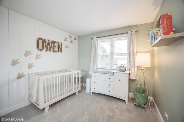 3925 Williams St, Downers Grove, IL 60515 - carpeted bedroom featuring a crib and baseboards