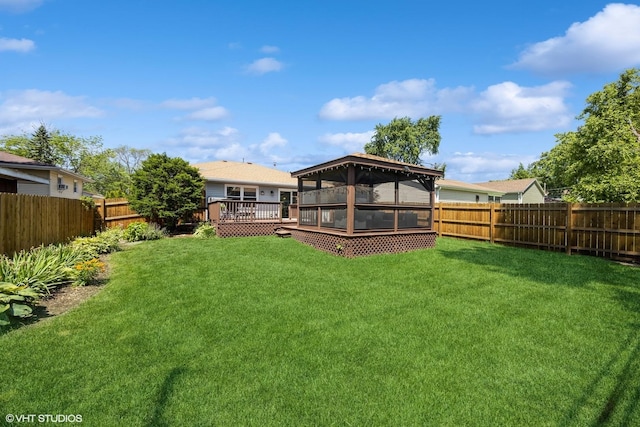 3925 Williams St, Downers Grove, IL 60515 - fenced backyard with a wooden deck and a sunroom