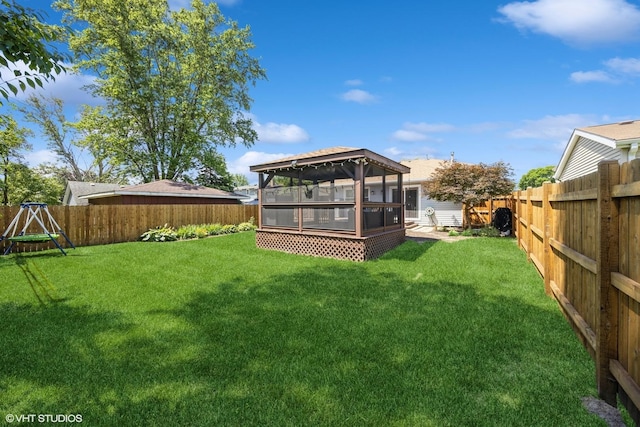 3925 Williams St, Downers Grove, IL 60515 - fenced backyard with a sunroom