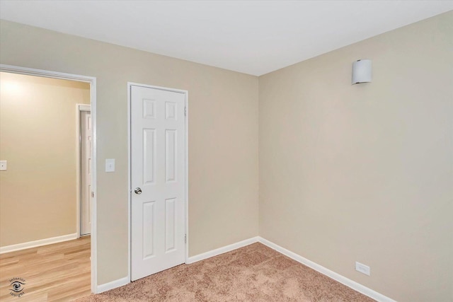 3102 Stafford Dr, Markham, IL 60428 - unfurnished bedroom with baseboards and light colored carpet