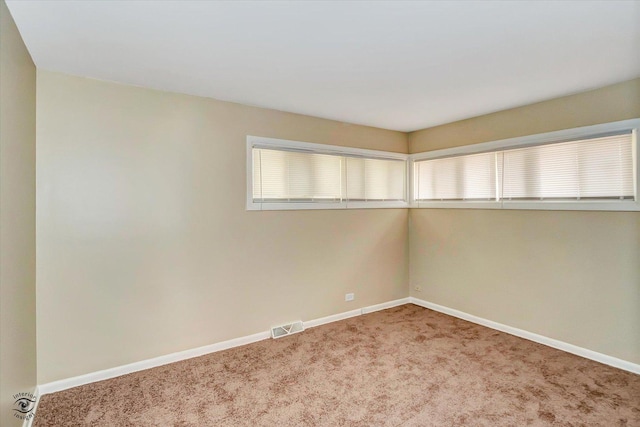 3102 Stafford Dr, Markham, IL 60428 - spare room featuring baseboards and carpet flooring