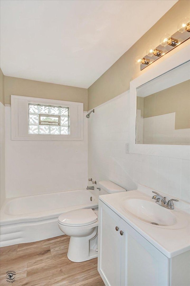 3102 Stafford Dr, Markham, IL 60428 - bathroom featuring vanity, tub / shower combination, and wood finished floors