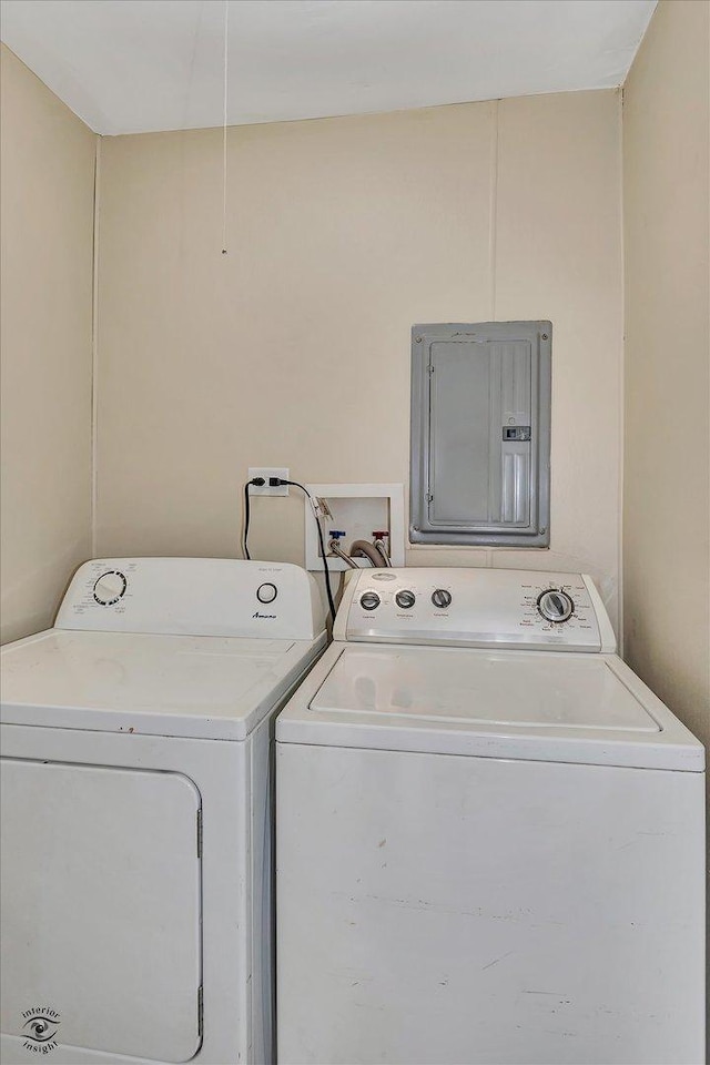 3102 Stafford Dr, Markham, IL 60428 - laundry room featuring electric panel and washer and dryer