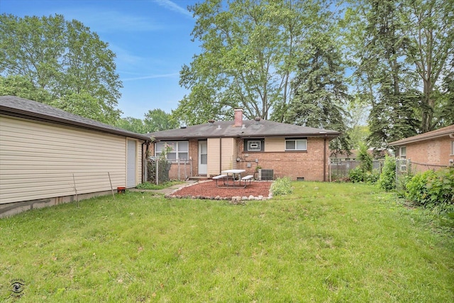 3102 Stafford Dr, Markham, IL 60428 - back of house with brick siding, a chimney, and a patio area