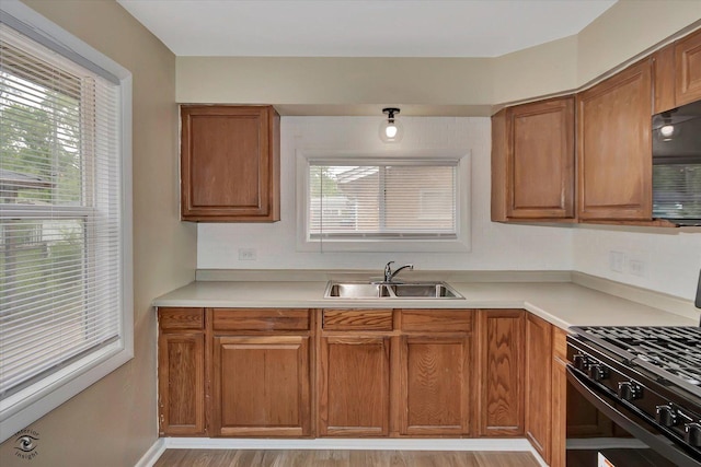 3102 Stafford Dr, Markham, IL 60428 - kitchen with black appliances, brown cabinets, and light countertops