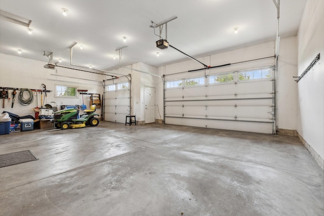 207 Quinlan Ave, Dekalb, IL 60115 - garage with a garage door opener