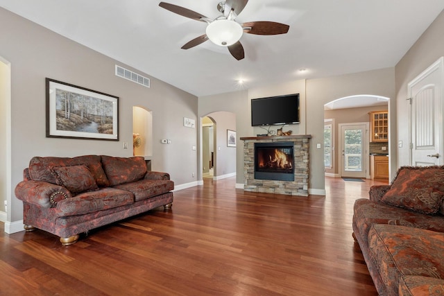 207 Quinlan Ave, Dekalb, IL 60115 - living room featuring ceiling fan, wood finished floors, and a fireplace