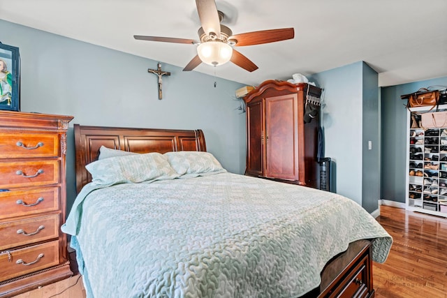 4000 Bayside Dr Unit 105, Palatine, IL 60074 - bedroom with wood finished floors and ceiling fan