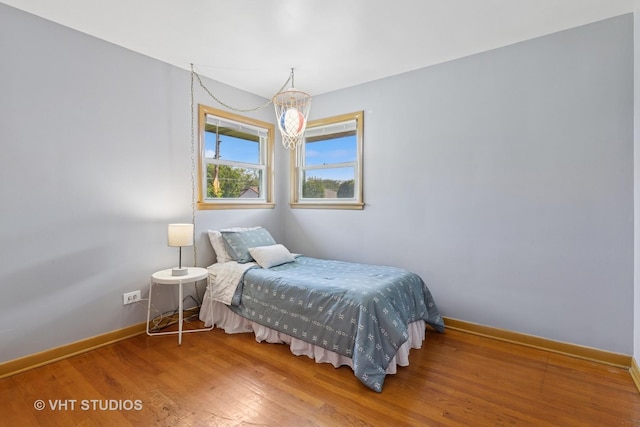 8544 W Roseview Dr, Niles, IL 60714 - bedroom with baseboards and wood finished floors