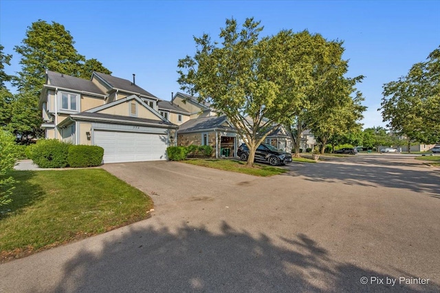 372 Goshawk Ln, Deerfield, IL 60015 - view of front facade with asphalt driveway and a front yard