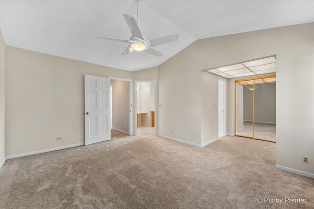 372 Goshawk Ln, Deerfield, IL 60015 - unfurnished bedroom with carpet floors, a closet, lofted ceiling, ceiling fan, and ensuite bathroom