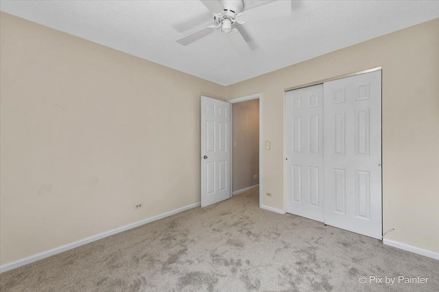 372 Goshawk Ln, Deerfield, IL 60015 - unfurnished bedroom featuring carpet floors, a closet, and a ceiling fan