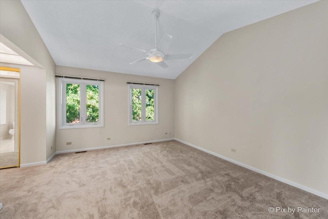 372 Goshawk Ln, Deerfield, IL 60015 - empty room with vaulted ceiling, ceiling fan, and carpet