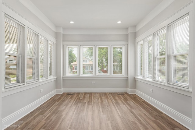 2028 S 5th Ave, Maywood, IL 60153 - unfurnished sunroom with wood finished floors and recessed lighting