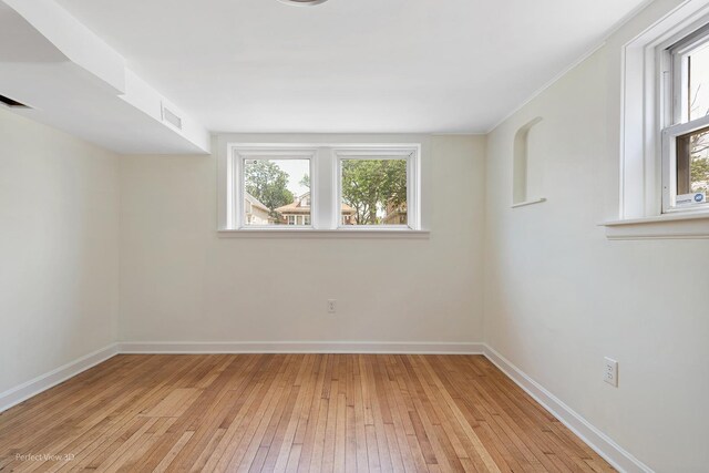 2028 S 5th Ave, Maywood, IL 60153 - spare room featuring light wood-style floors and baseboards