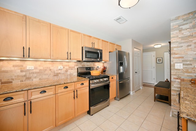 875 E 22nd St Unit 220, Lombard, IL 60148 - kitchen with stainless steel appliances, light brown cabinets, tasteful backsplash, light tile patterned floors, and light stone countertops