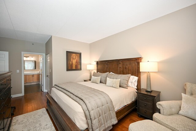 875 E 22nd St Unit 220, Lombard, IL 60148 - bedroom featuring dark wood-style flooring and ensuite bath