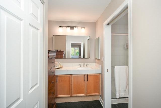 875 E 22nd St Unit 220, Lombard, IL 60148 - bathroom featuring vanity, a shower, and tile patterned floors