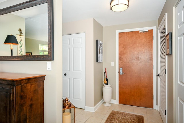 875 E 22nd St Unit 220, Lombard, IL 60148 - entrance foyer with light tile patterned floors and baseboards