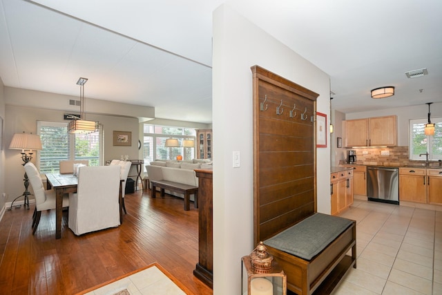 875 E 22nd St Unit 220, Lombard, IL 60148 - dining room with light wood-style floors