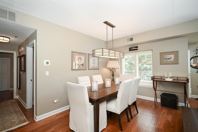 875 E 22nd St Unit 220, Lombard, IL 60148 - dining area featuring wood finished floors and baseboards