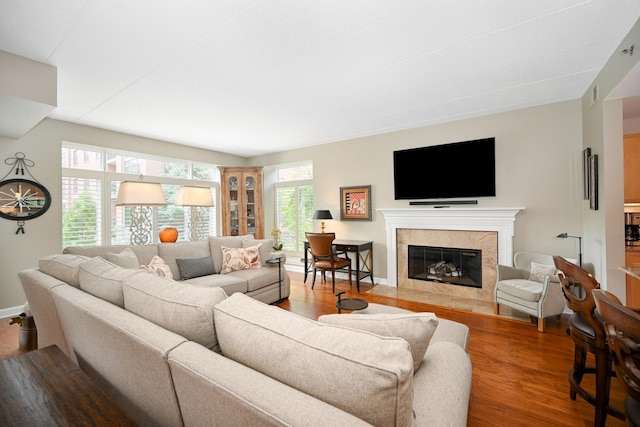 875 E 22nd St Unit 220, Lombard, IL 60148 - living room featuring wood finished floors and a high end fireplace