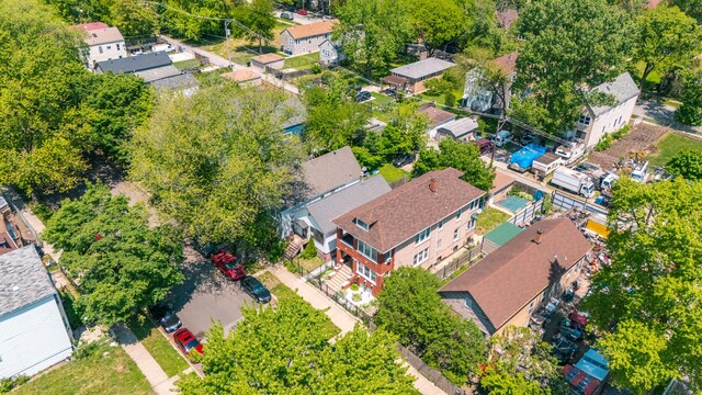 aerial view of property's location featuring nearby suburban area