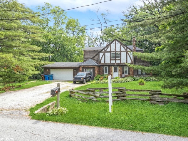 11933 S 70th Ave, Palos Heights, IL 60463 - tudor home featuring dirt driveway, a chimney, a garage, and a front yard