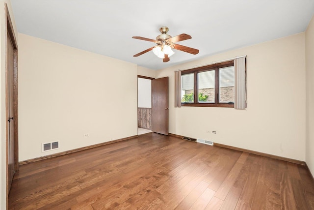 14023 S Split Rail Dr, Homer Glen, IL 60491 - spare room with ceiling fan and wood finished floors