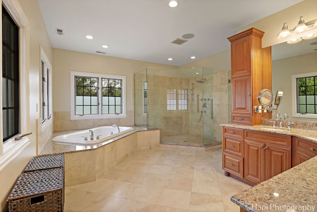 1400 Banbury Rd, Inverness, IL 60067 - full bathroom featuring vanity, a garden tub, a stall shower, tile patterned floors, and recessed lighting